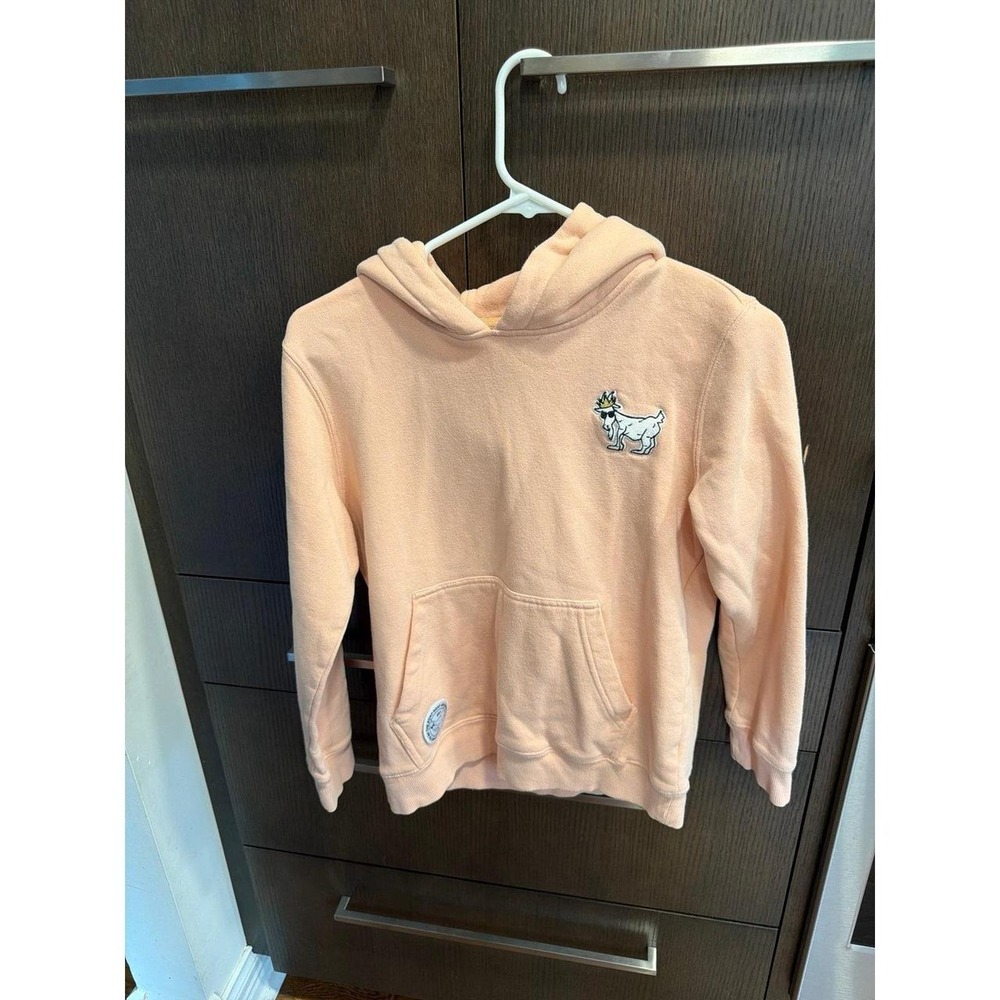 GOAT USA OG hooded sweatshirt is featured in a soft peach color Kids XL